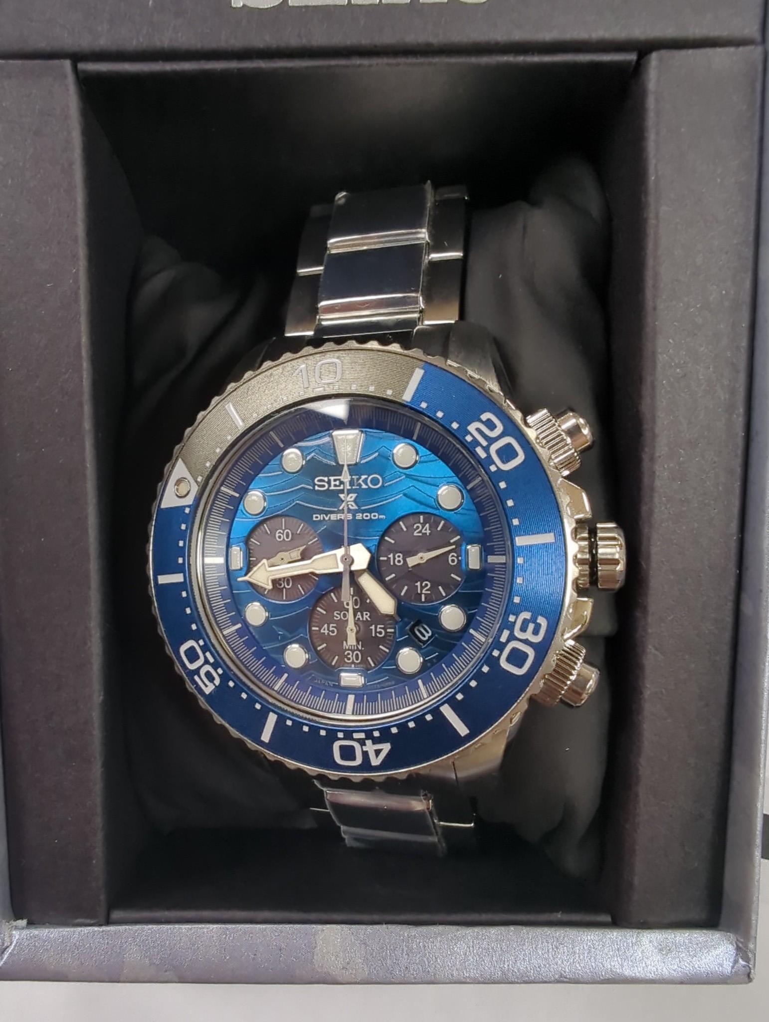 Twenty assorted gentleman's modern wrist watches including Design Lige Watch 1856, Seiko Automatic Divers, Seiko 5 Sport, Seiko Connoisseur quartz, Citizen Ecodrive, Casio Beside, Pagani Design, Maurice Lacroix, Morellat